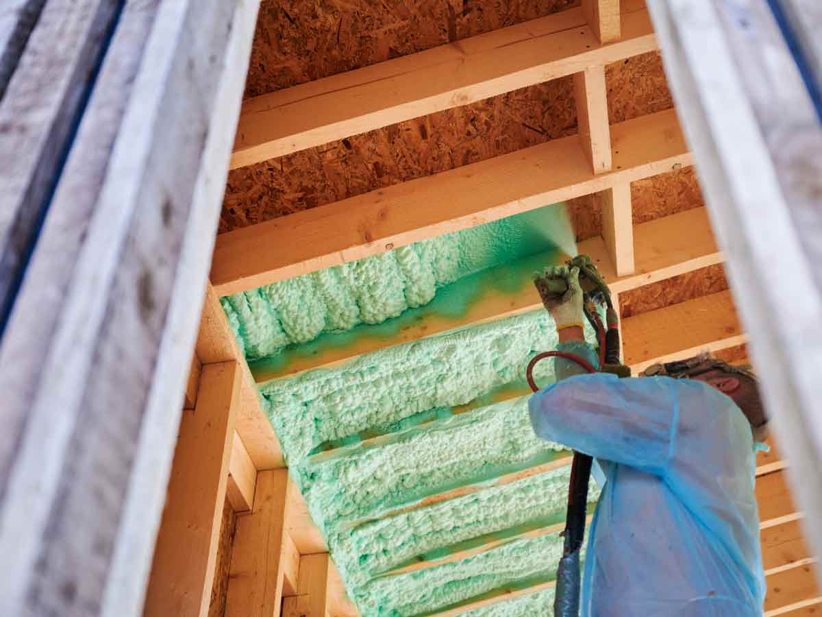 Spray foam insulation installer, insulating home's celing.