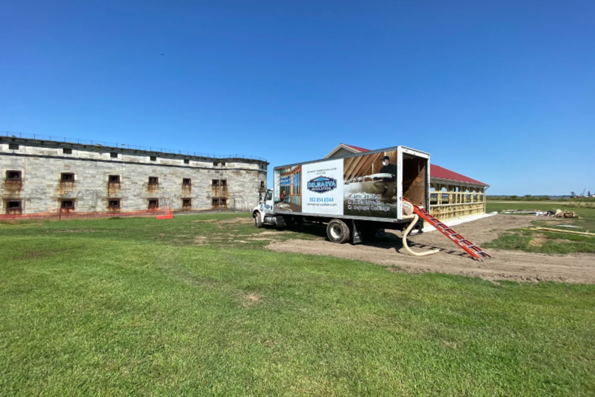 Commercial installation (state owned buildings) on Pea Patch Island. Trucks taken to job on a barge.