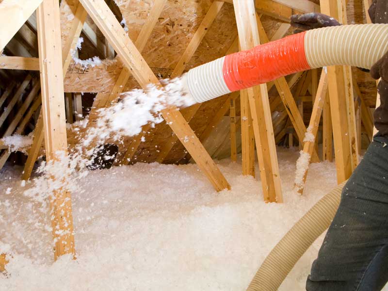 Blown-in fiberglass in home's attic