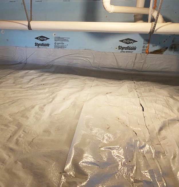 New sump pump and basin, EZ drain system, and Pop Up drain in a crawl space.